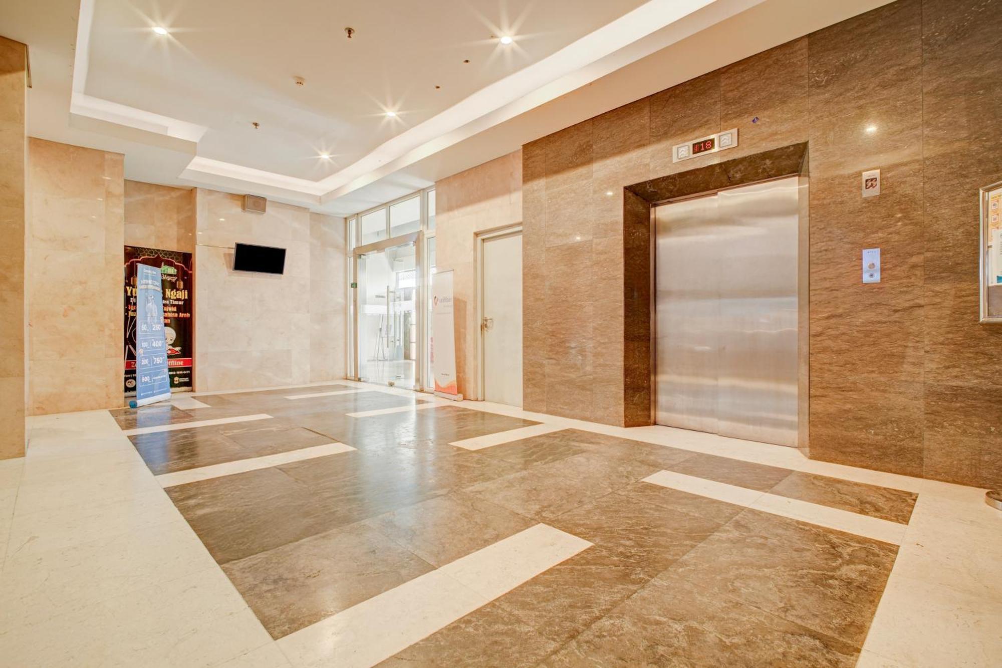 Hotel Collection O Near Terminal Pulo Gebang Formerly Sentra Timur - Tower Sapphire Jakarta