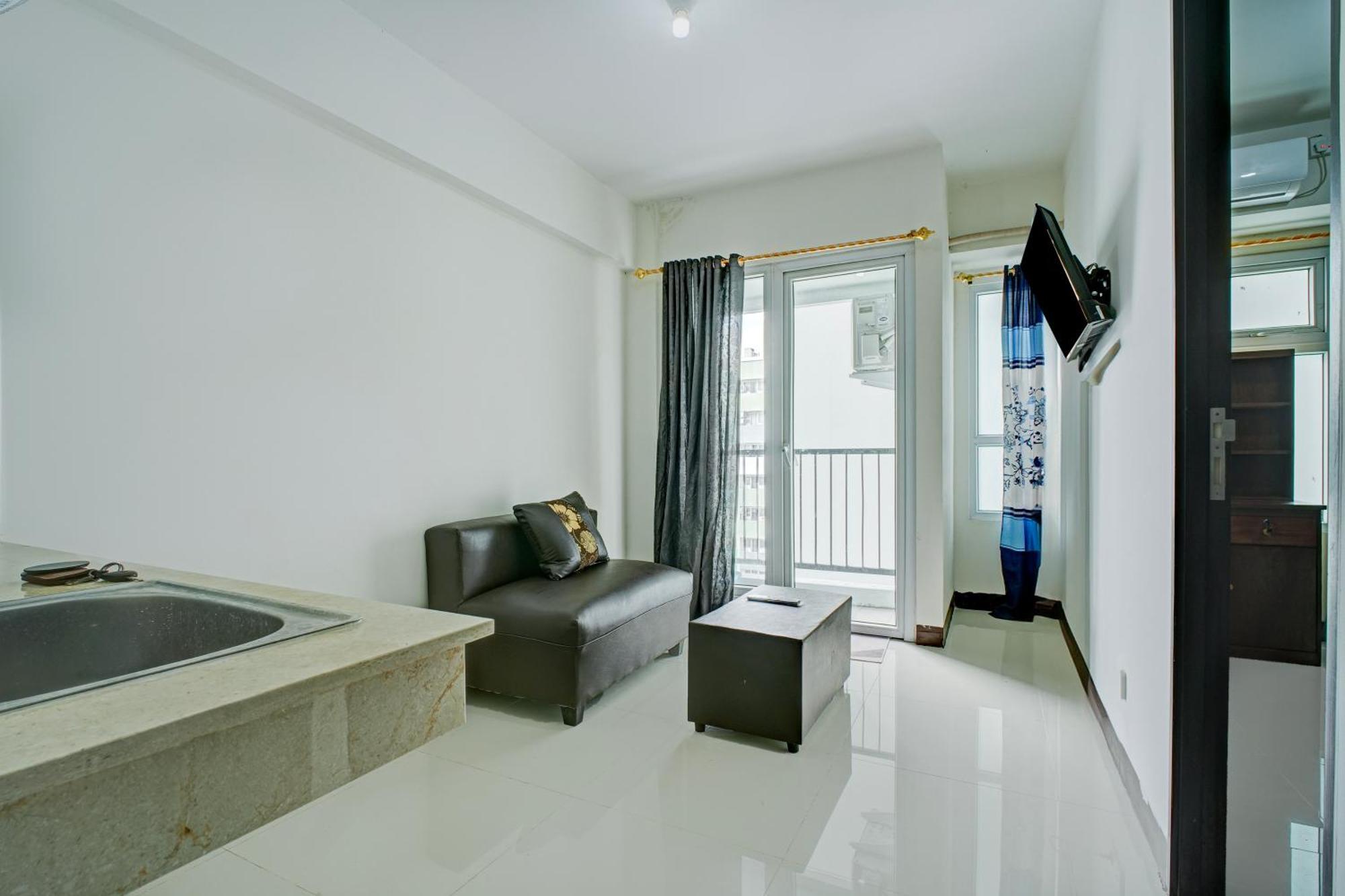 Hotel Collection O Near Terminal Pulo Gebang Formerly Sentra Timur - Tower Sapphire